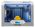 Front image of Dremel Digilab 3D40-FLX 3D printer with yellow gear on bed, printer on and lit up.