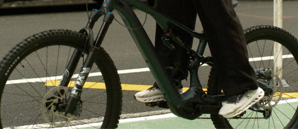 An E-MTB being ridden in a city