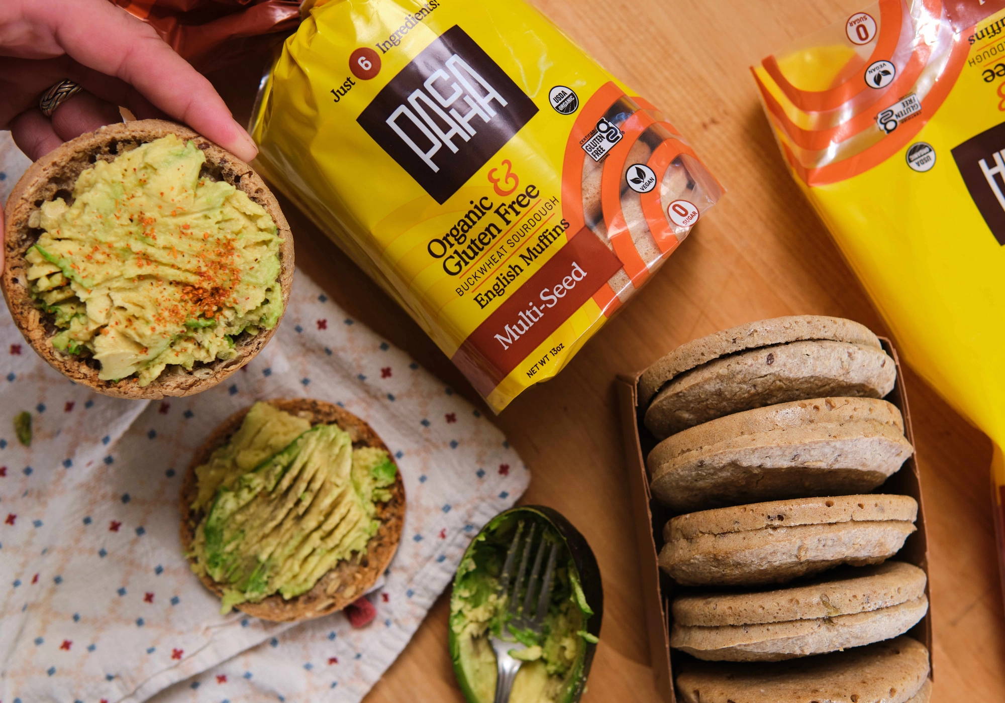 Sliced PACHA English Muffin made with sprouted buckwheat, showing its hearty texture and open crumb.