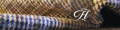 Logo Usine de filage de Harris Tweed Harris Tweed Hebrides avec une étoffe de Harris Tweed de différentes couleurs