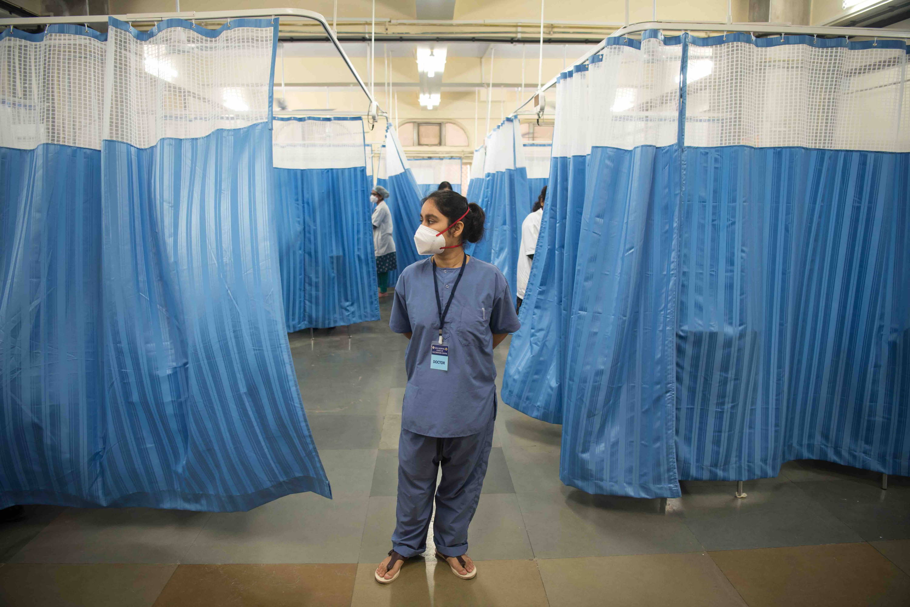 Member of staff on hospital ward in Mumbai, India