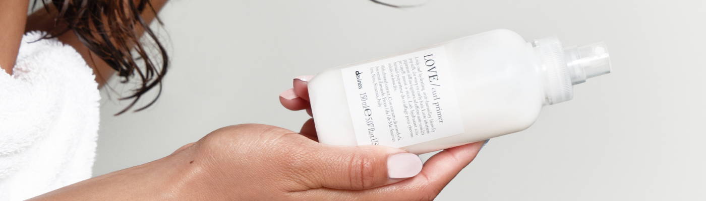 Davines model with platinum blonde hair in a french bob haircut