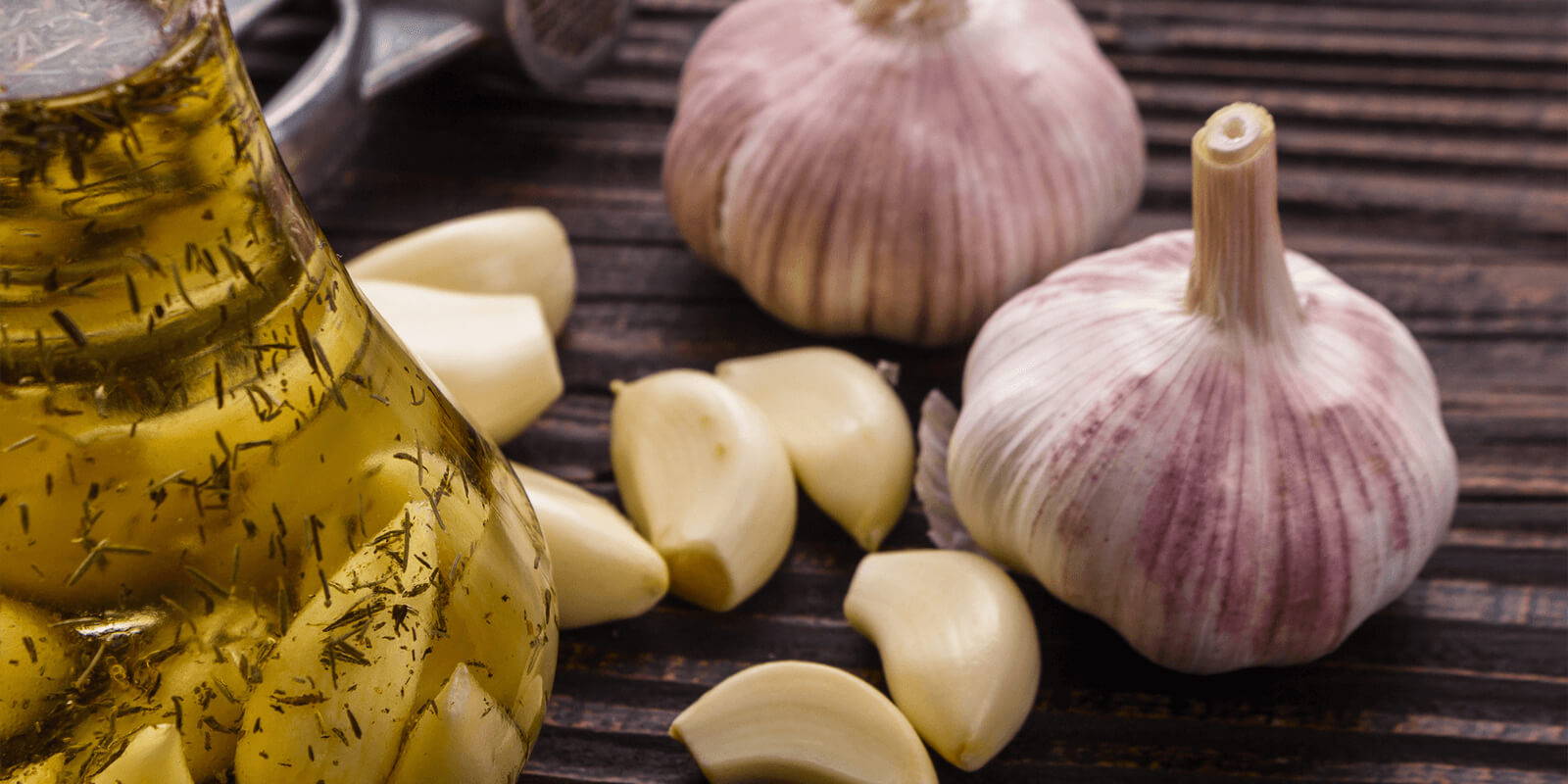 Garlic cloves and olive oil.