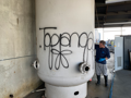 remove graffiti from metal tank