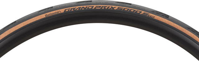 Continental Grand Prix 5000 S TR racefietsband met transparante bruine zijwand en zwarte tubeless ready loopstrook.