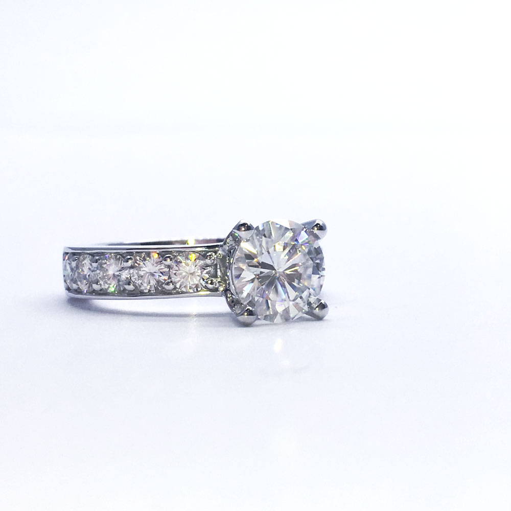 Custom white gold and diamond engagement ring