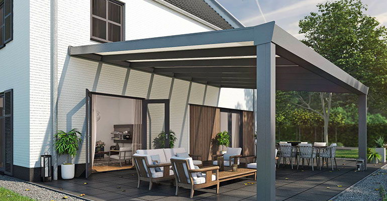 Pergola à couverture vitrée devant une maison