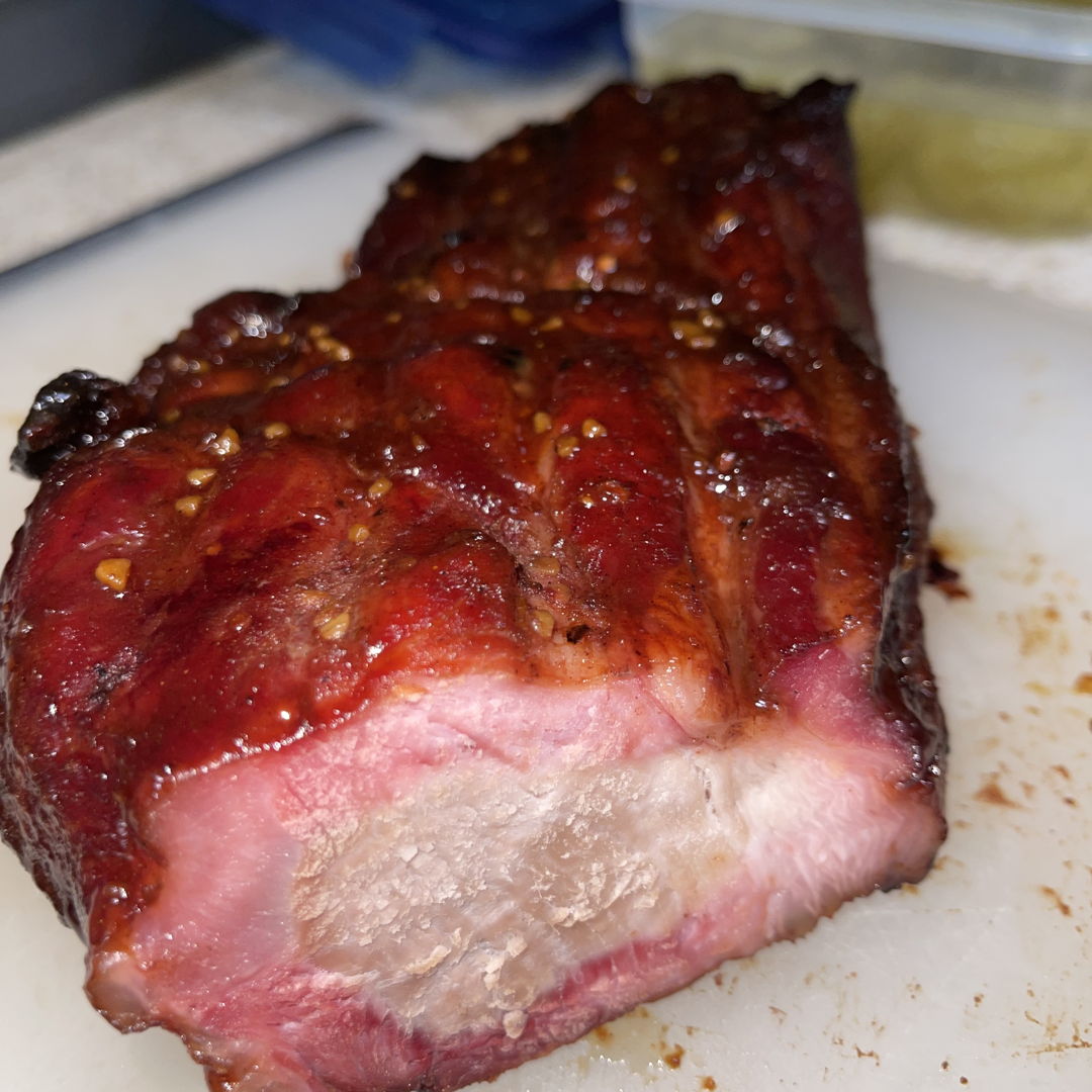 Char siu, done in a smoker at 225 until internal temp reached 225F, finished at 250F.  Was pleased with the result, and will do it again!