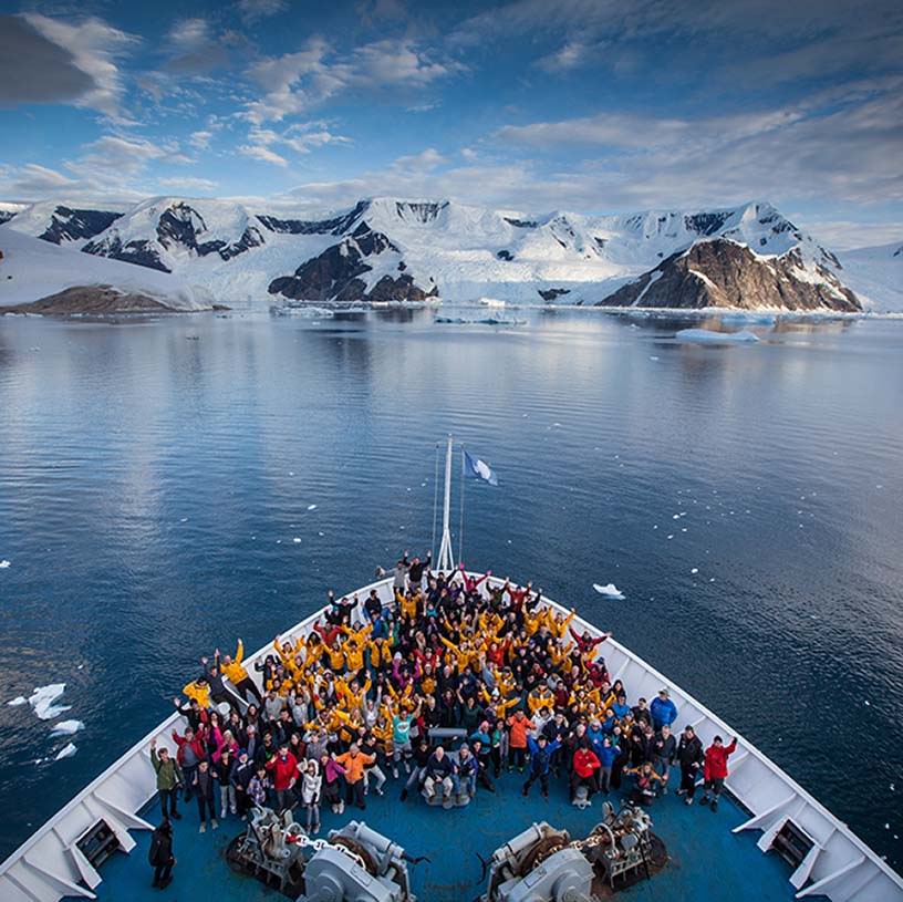 People on a boat on the arctic sea