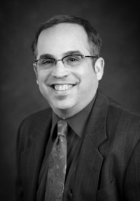 Mark Cohen is a former Janus Capital webmaster who will try to pioneer a social media strategy for Cambridge Investment Research.