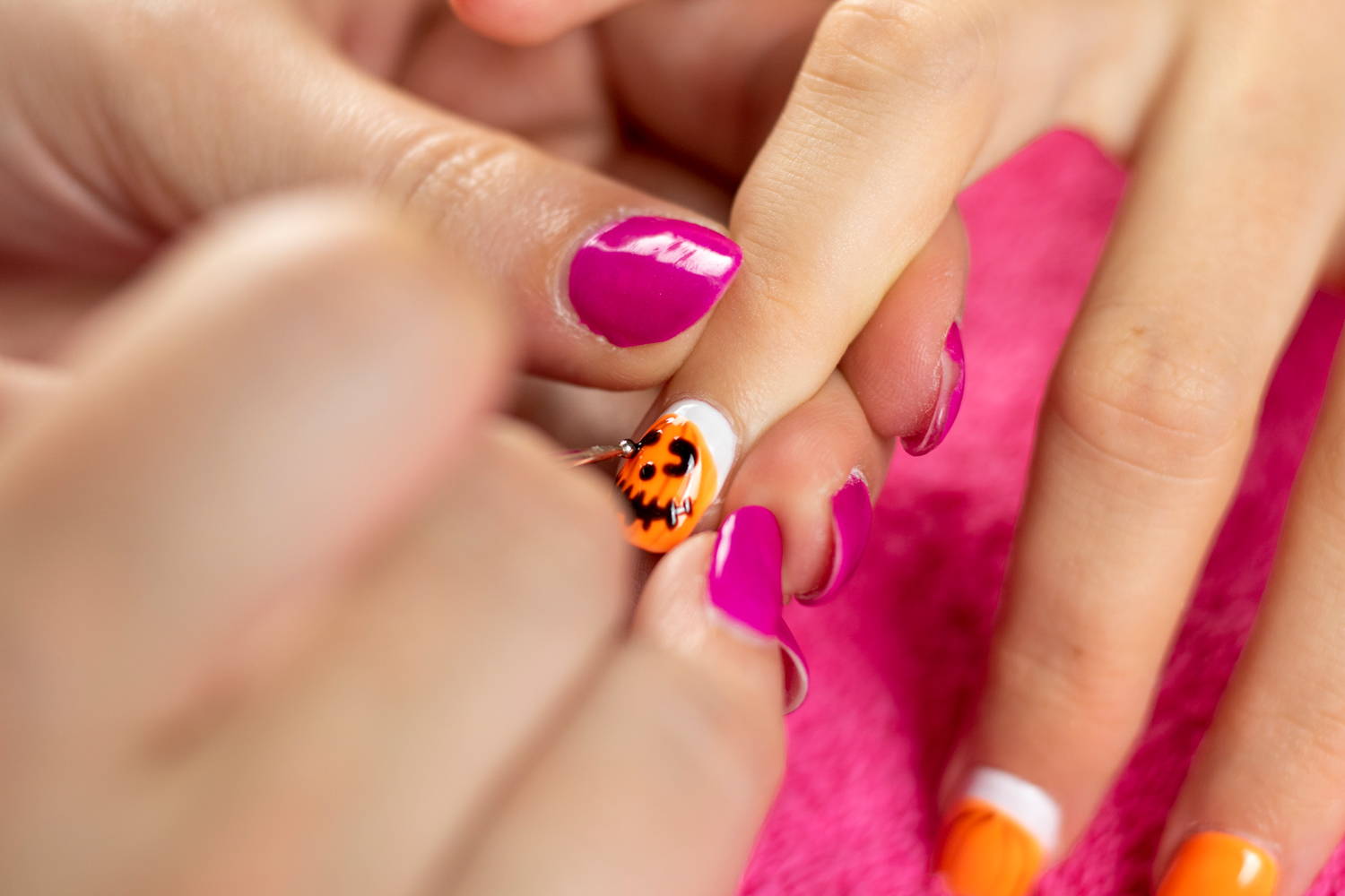 Pumpkin nails eye details added to nail using a dotting tool and ORLY Liquid Vinyl