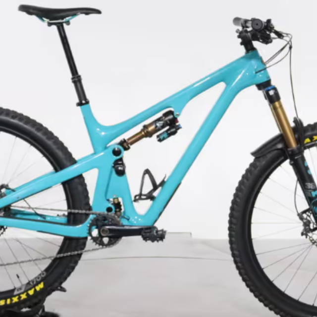 a blue full suspension yeti mountain bike