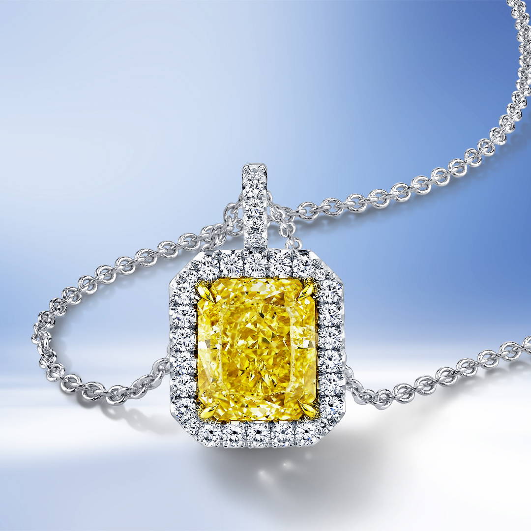 Yellow and white diamond pendant