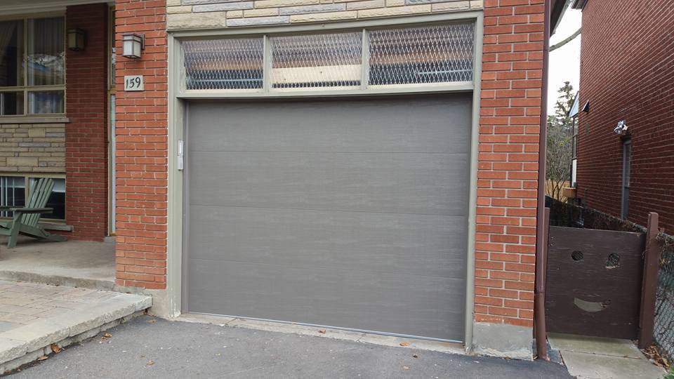 struggling garage door repair fix