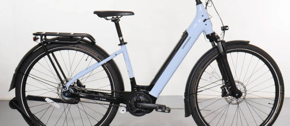 A light blue Cannondale Mavaro Neo 3 electric city bike