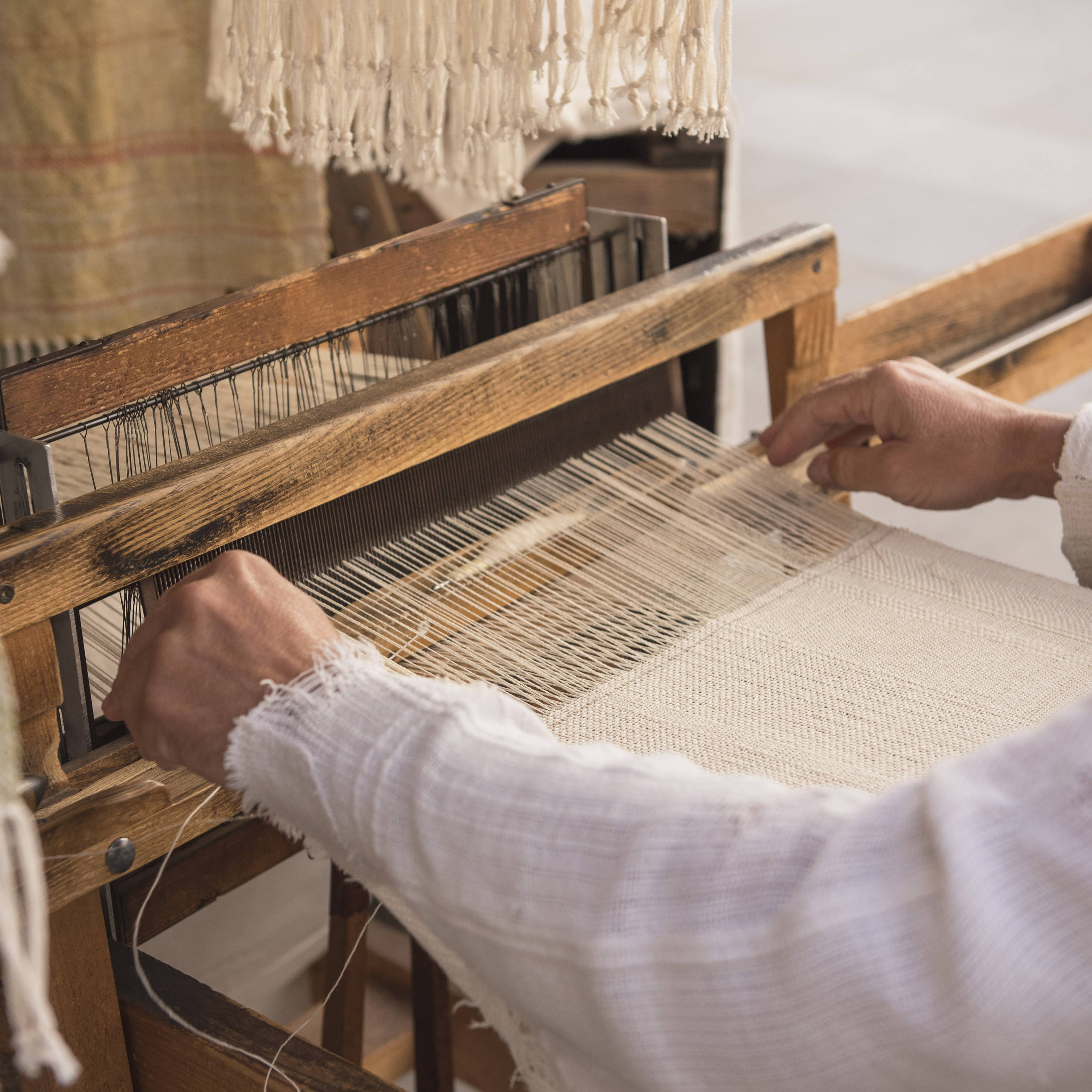 Artisan hand-weaving sustainable home decor