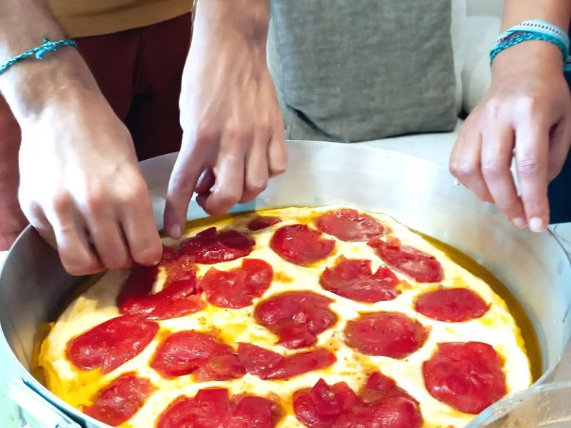 Cooking classes Lecce: A journey through tradition: Focaccia Barese as a family.