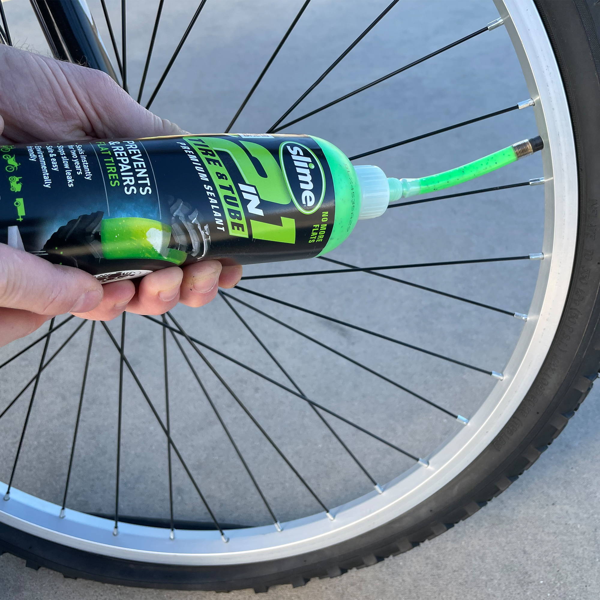 Install Slime 2-in-1 Tire & Tube Sealant into Bicycle Tire