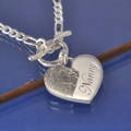 handmade fingerprint jewellery, a heart shaped fingerprint necklace on a t bar chain.