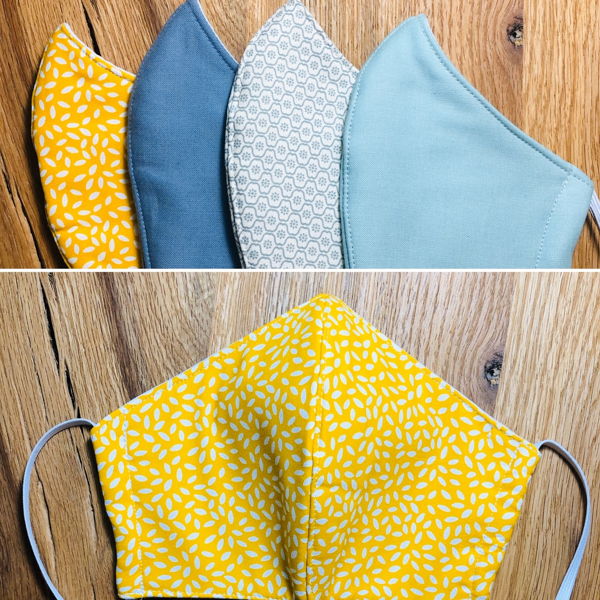 masque-arrondi-a-3-couches-jaune-motifs-blancs-taille-s