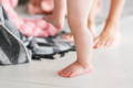 Barefoot baby learning to walk
