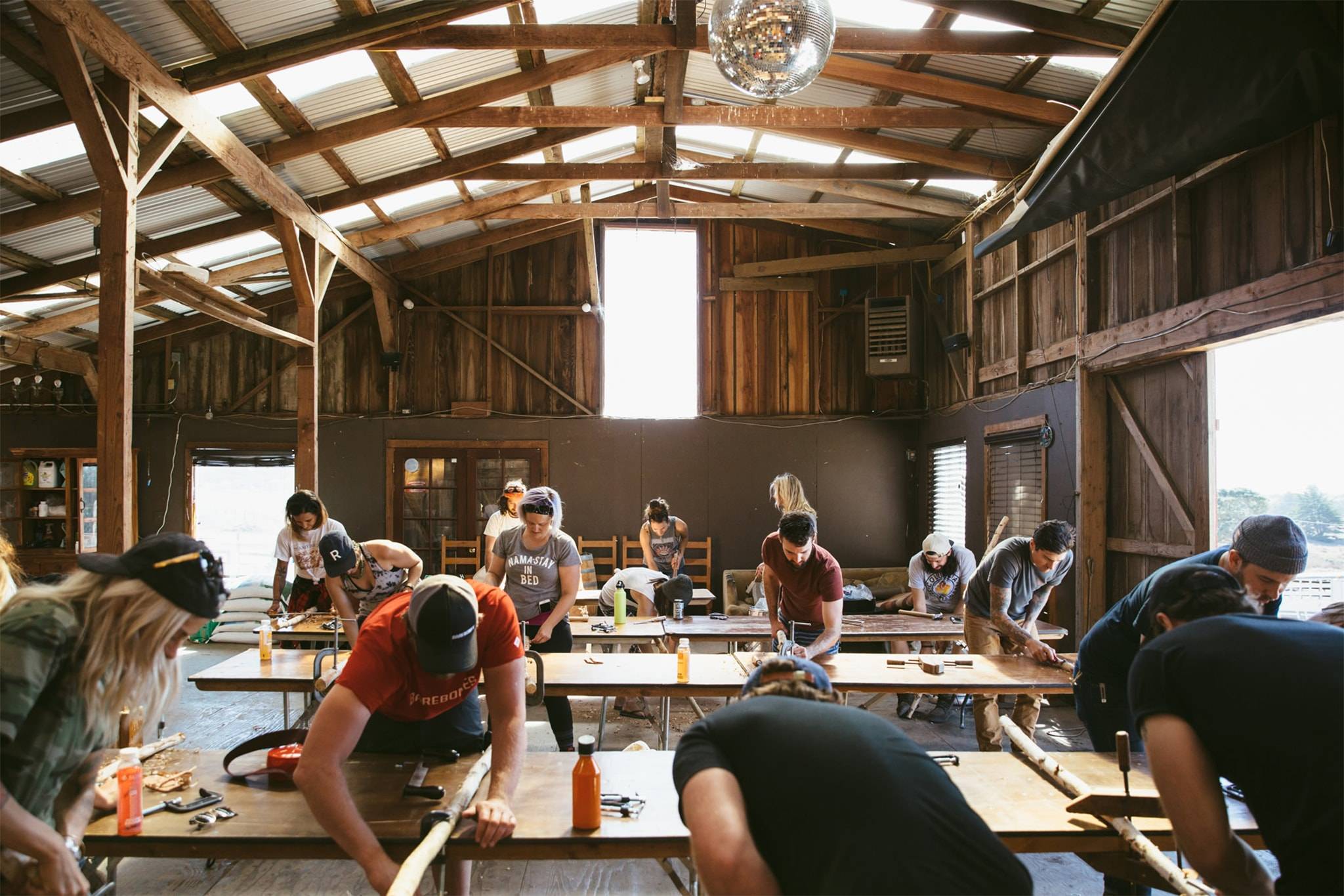A group of people working inside a worksop