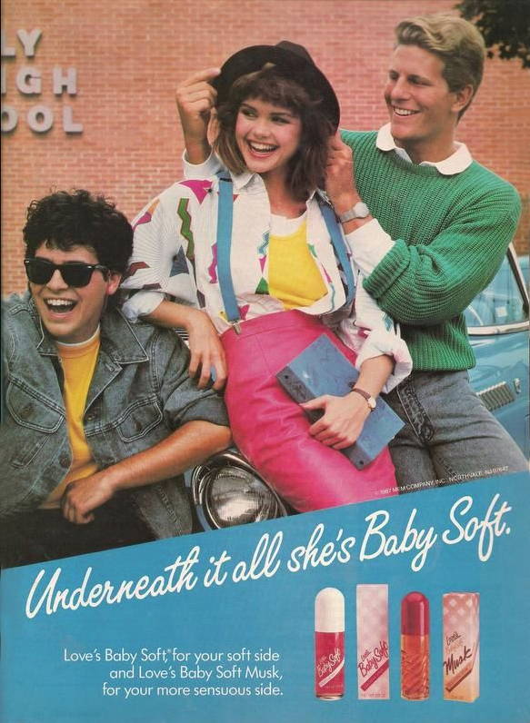 Love's Baby Soft vintage ad with college 2 young men a young woman laughing near a car: "Underneath it all she's Baby Soft"