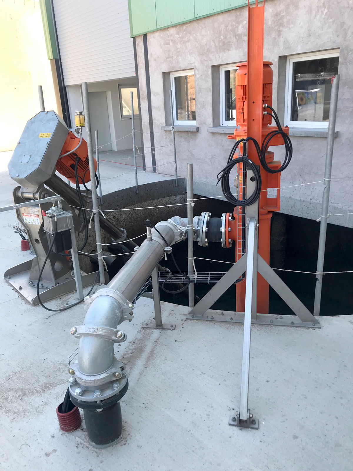 eccentric screw pump installation beside a livestock slurry pit