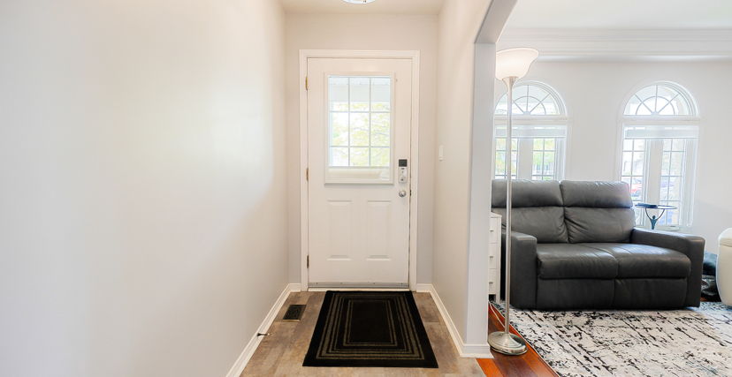 hardwood floored entrance foyer featuring natural light