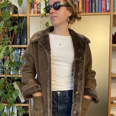 Coat with fake fur
