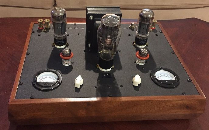 Walnut base, dual meters, single input, RCA and speaker outputs