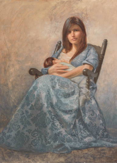 A mother sitting in a rocking chair nursing her child.