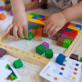 Little girl playing with the Montessori Art Builder Set.