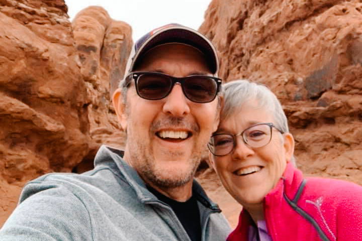 Paul and Meredith at Arches National Park in November 2020, one of the first trips they took in their Storyteller Overland Classic MODE van.