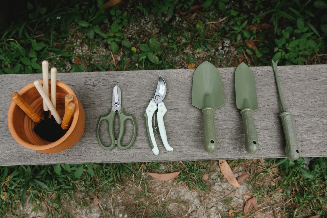 Garden hand tools on a bench