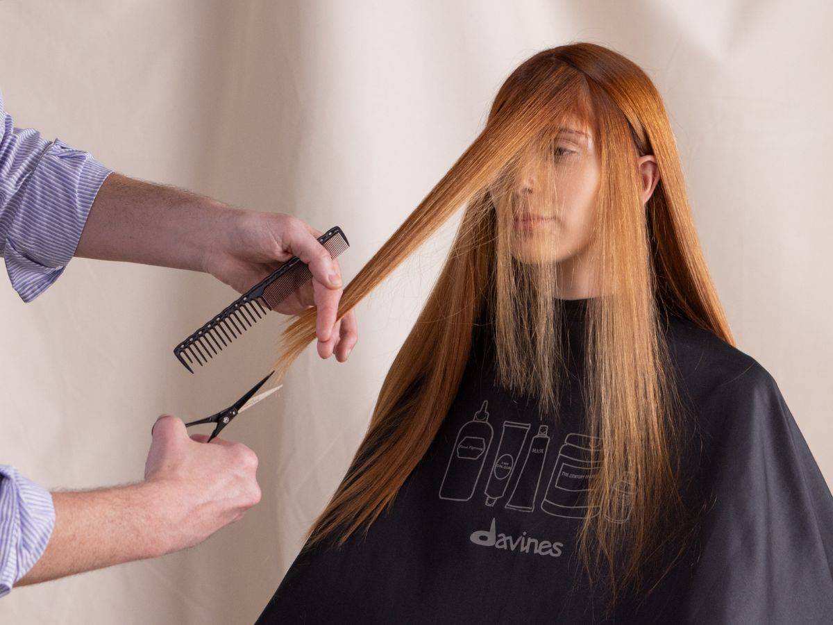 woman getting Davines Naturaltech ENERGIZING treatment in a salon