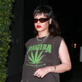 Rihanna wearing a weed themed Pantera tank top