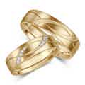 Designer wedding rings for her in platinum and  18 carat gold - Pobjoy Diamonds in Surrey