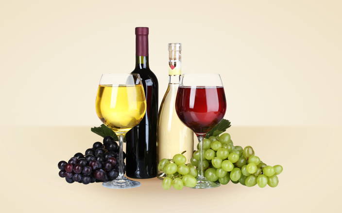 Glasses of red wine and white wine, bottles of wine, and grapes (preview)