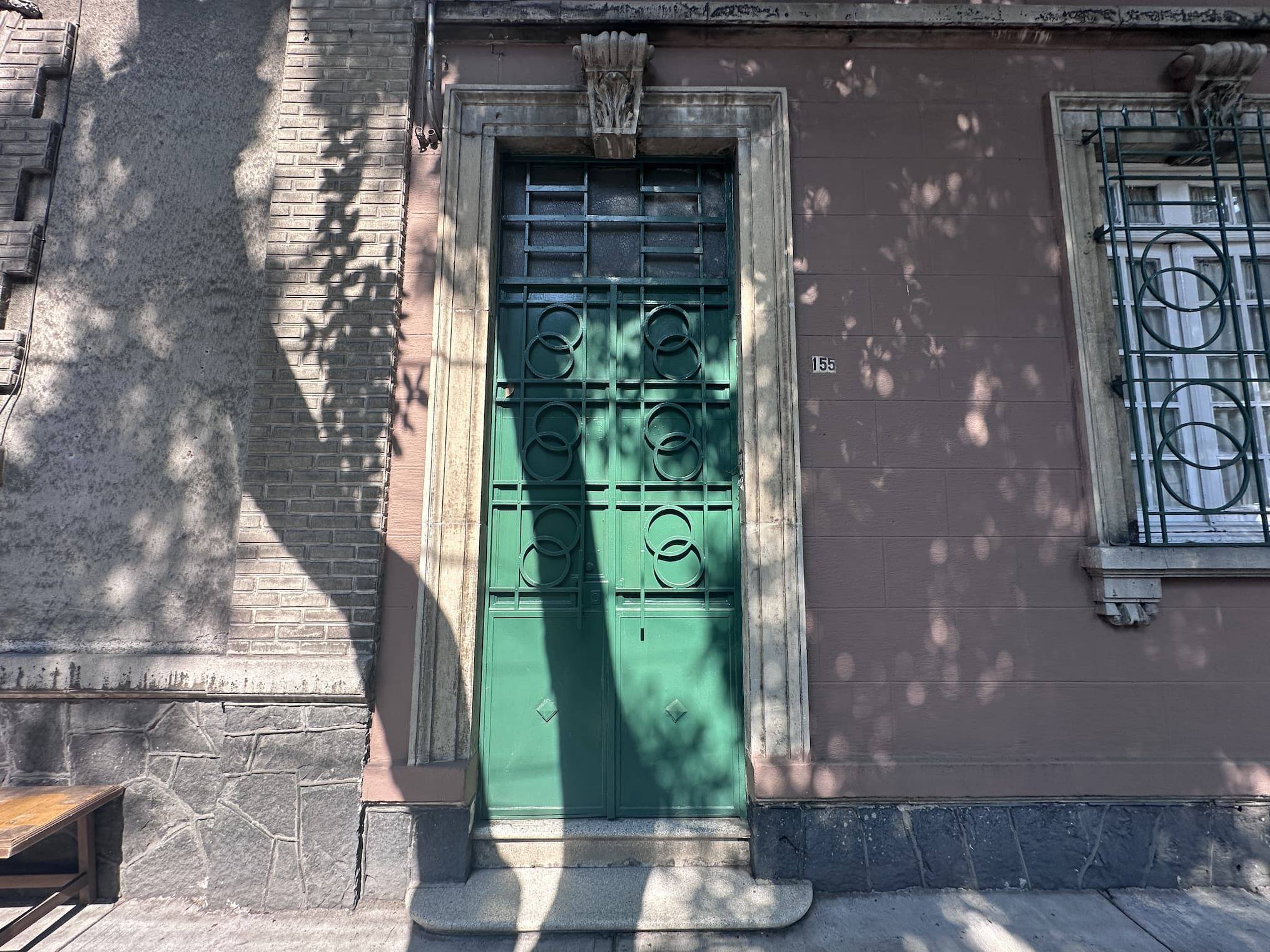 Green architectural door in Mexico City