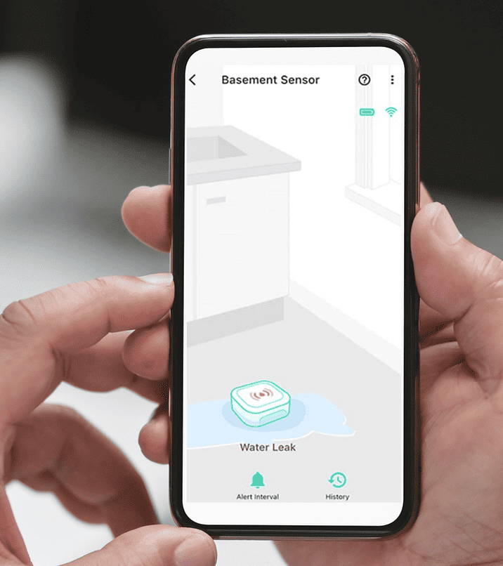 Family reading next to a FlexFob mounted on the wall beside the bed.