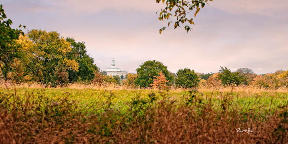 A big field stretched out in front of the Nauvoo Temple.