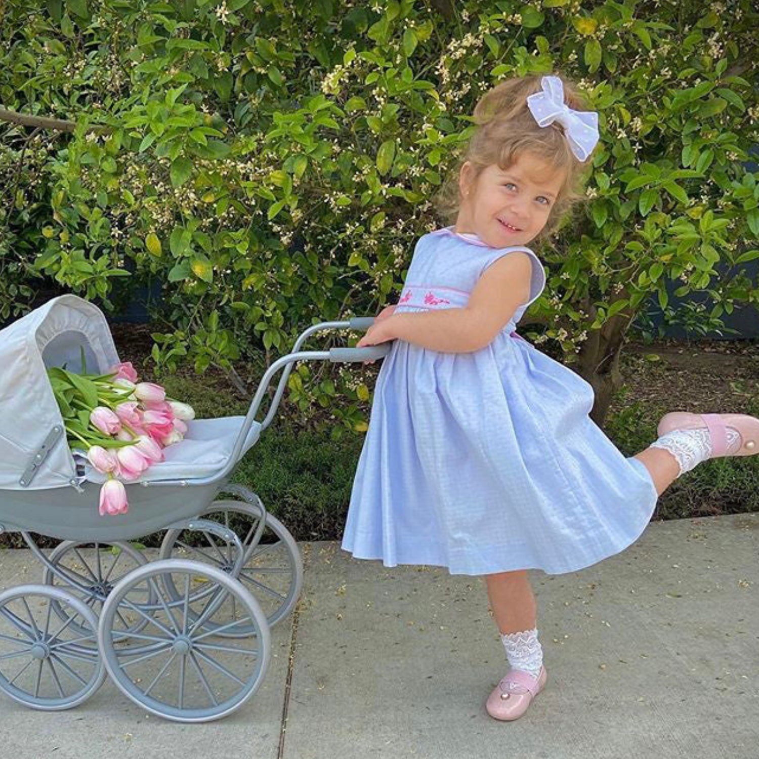 Baby blue smocked dress with bows