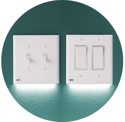 Set of double gang SwitchLights on a teal wall