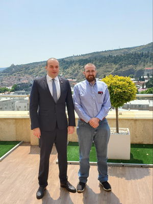 Georgian prime minister Mamuka Bakhtadze with Charles Hoskinson