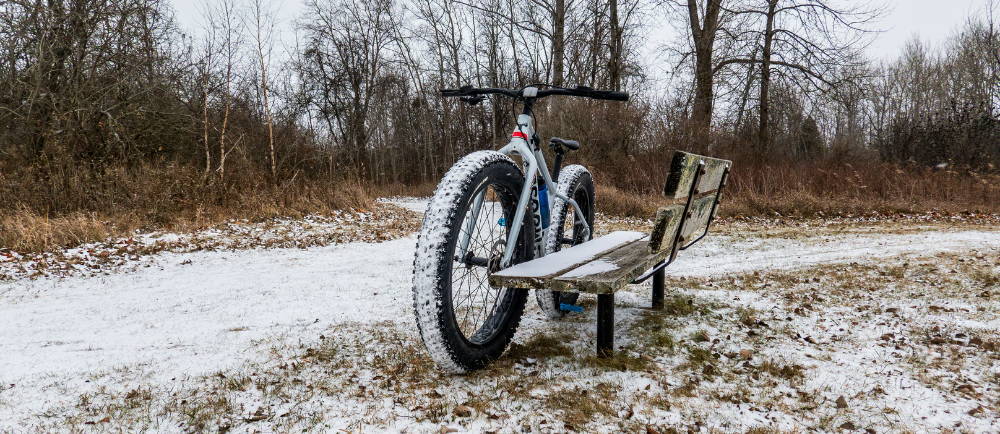 Fat tire bike riding in snowy glacier