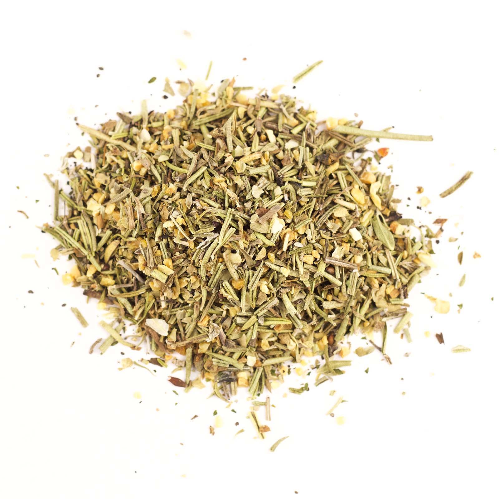 A rough greenish spice mixture on a white background