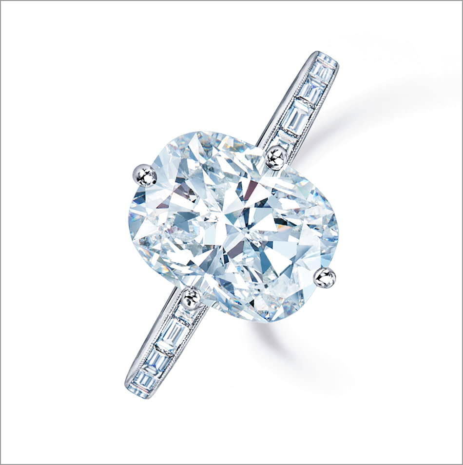 Top view of a Kwiat Cushion Diamond engagement ring on a white gold band. 