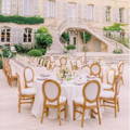 banquet with white table linens for an oudoor wedding