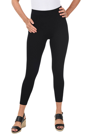 A woman wears a pair of black zipper cropped stretch legging.